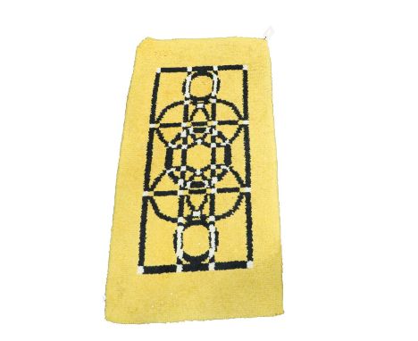 An Irish woolen Dun Emer guild type Rug, the mustard ground with central Celtic motif, as a fabric, approx. 138cms long x 72c