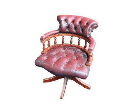 A leather covered deep button design, horse shoe shaped, Swivel Office Chair. (1)