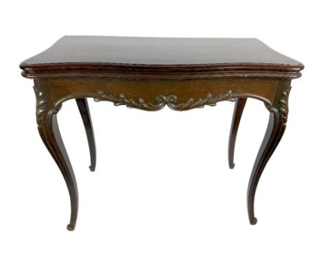 A fine quality Victorian rosewood fold-over Card Table, the serpentine front above a frieze with central carving on cabriole 