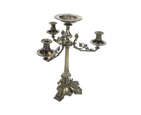 An attractive Egyptian Revival three branch silver plated Centre Candelabra, decorated with rams head reeded column, on a sha
