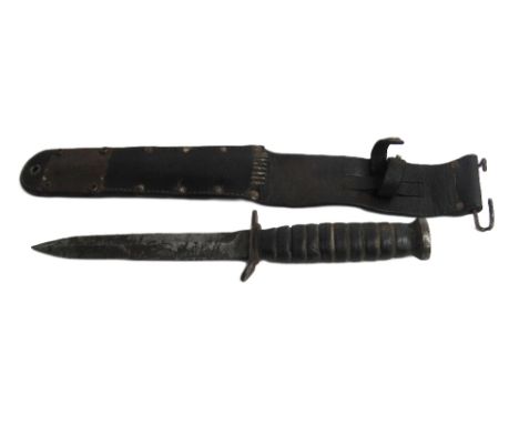 Militaria: A Rare World War II Army Issue 'U.S. Marines' Dagger, with pointed blade, inscribed, in original leather scabbard 