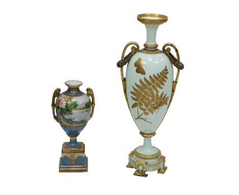 A late 19th Century Royal Worcester two handled Portrait Vase, with a young Lady with blue shawl and white dress holding red 