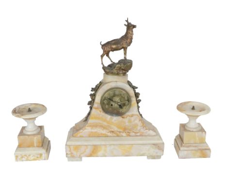 A large heavy onyx three piece Mantle Clock Garniture, the arch formed case with gilt metal mounts, surmounted with a stag ov