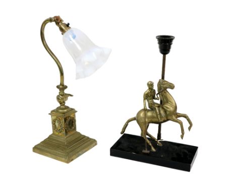 A brass Table Lamp, modelled as a Polo Player on horseback, on an ebonised plinth base; together with another adjustable orna