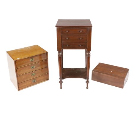 A mahogany three drawer Curio Locker, with turned handles on tapering legs, united by shelf stretcher, an Edwardian oak four 