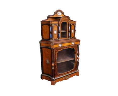 A late 19th Century / early 20th Century French&nbsp;satinwood and marquetry Cabinet, with brass mounts, the arched upper sec