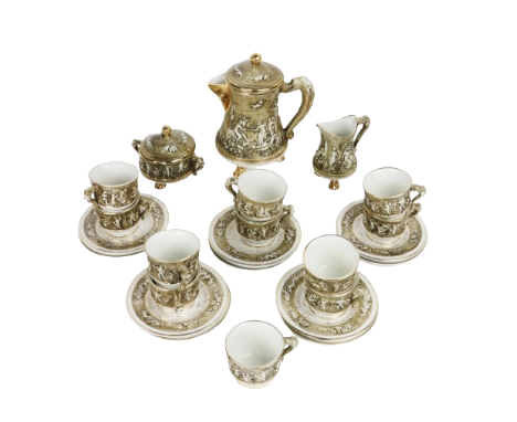A very unusual relief moulded Capi-di-monte Coffee Service,&nbsp;with classical figures in relief in parcel gilt and monochro