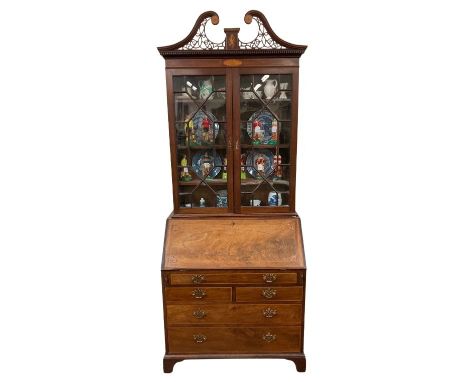 A good George III period inlaid&nbsp;mahogany Bureau Bookcase,&nbsp;the open work swan neck pediment with two satinwood round