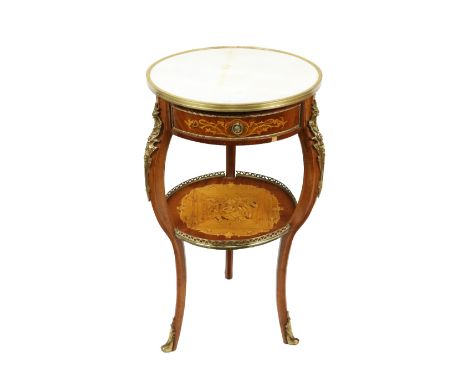 An attractive circular marble top two tier Centre Table,&nbsp; with moulded brass rim above an inlaid frieze with drawer on s