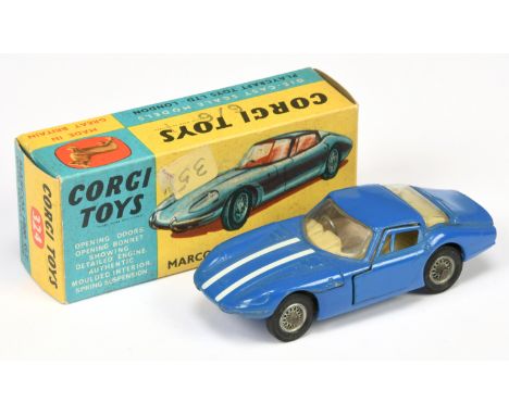 Corgi Toys 324 Marcos 1800 GT - blue body, and white stripes pale avocado interior with figure driver, white bonnet stripes a