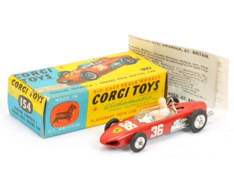 Corgi Toys 154 Ferrari Formula 1 "Grand Prix" Racing Car - red body with silver base, chrome trim, figure driver, spun hubs a