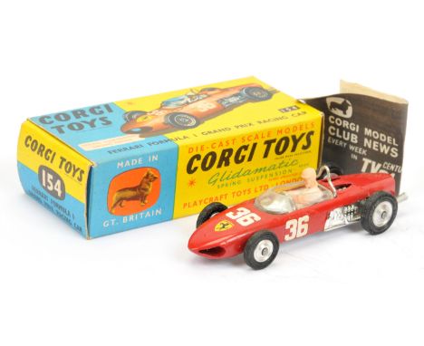 Corgi Toys 154 Ferrari Formula 1 "Grand Prix" Racing Car - red body with silver base, chrome trim, figure driver, spun hubs a