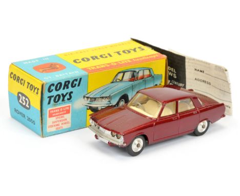 Corgi Toys 252 Rover 2000 - metallic maroon body, cream interior, silver trim, spun hubs&nbsp; and "Trans-o-Lite" headlights 