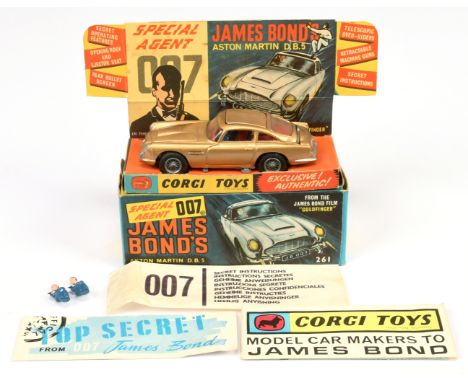 Corgi Toys 261 "James Bond" Aston Martin DB5 taken from the film "Goldfinger" - gold body, red interior with "James Bond &amp