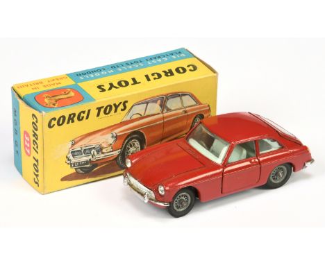 Corgi Toys 327 MGB GT - red body with pale blue interior, chrome trim, wire wheels and black luggage case - Excellent in a Go