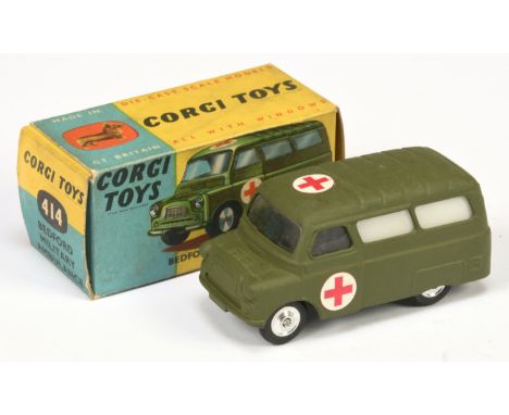 Corgi toys 414 Bedford Military "Ambulance" - green body, off white rear windows, red cross labels to roof and side doors, an