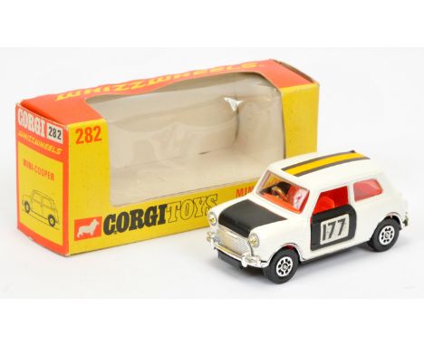 Corgi Toys 282 BMC Mini Cooper S Rally Car - white body, black doors, bonnet and boot, orange and black roof stripe red inter