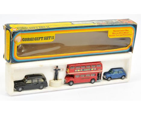 Corgi Toys GS11 Gift Set "London" to include (1) Austin "Taxi" - black body, lemon interior, silver trim and Whizzwheels, (2)