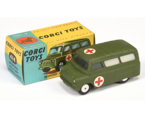 Corgi toys 414 Bedford Military "Ambulance" - green body, off white rear windows, red cross labels to roof and side doors, an