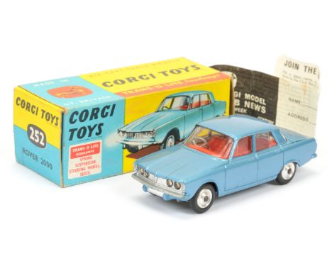 Corgi Toys 252 Rover 2000 - deep darker steel blue body, red interior, silver trim, spun hubs&nbsp; and "Trans-o-Lite" headli