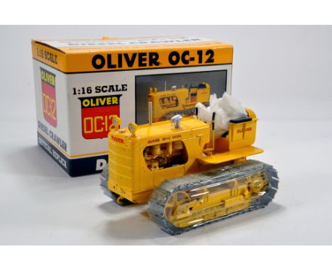 Spec Cast 1/16 Diecast Issue comprising Oliver OC-12 Crawler Tractor. E to NM to M in Box.