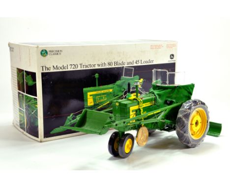 Ertl 1/16 diecast issue comprising John Deere 720 Tractor with blade and loader. Precision issue. VG to E in Box.