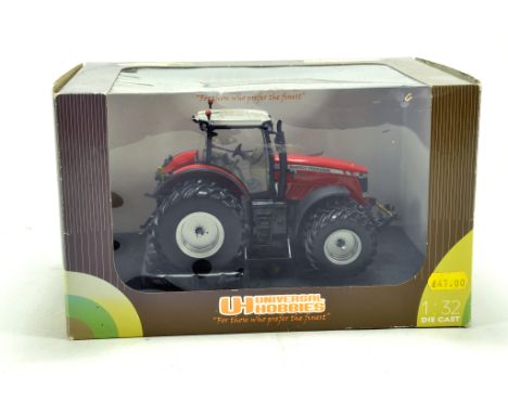 Universal Hobbies 1/32 diecast farm issue comprising Massey Ferguson 8690 Tractor on duals. NM to M in Box.