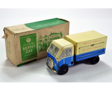 Chad Valley Tin Plate Clockwork No. 10134 Buffet Car in light lemon and blue with Mac's Snacks Decals. A rare find especially