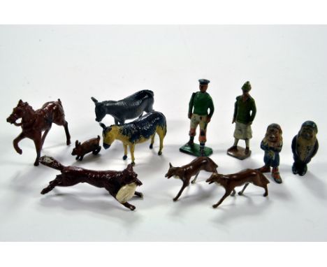 Interesting group of metal figures comprising Fox figures, Dwarf duo, Footballer and others. Britains, Johillco and others. (
