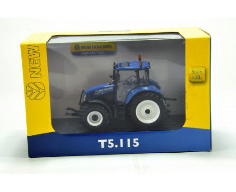 Universal Hobbies 1/32 farm issue comprising New Holland T5.115 Tractor. NM to M in Box.