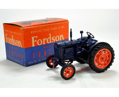 Chad Valley Fordson Major E27N Tractor. Clockwork Model with wind up crank arm. A beautiful example finished in blue with ora