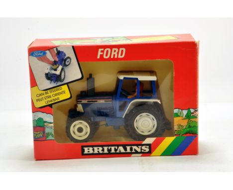 Britains 1/32 farm issue comprising Ford 5610 Tractor. E to NM to M in Box. 
