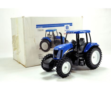 Scale Models 1/16 farm issue comprising New Holland TG285 Tractor. E to NM to M in Box.