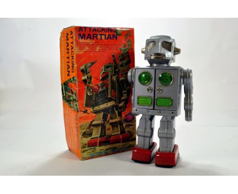 SH (Japan) Attacking Martian tinplate and plastic battery operated issue Robot in silver, red, green. Lovely example is E to 