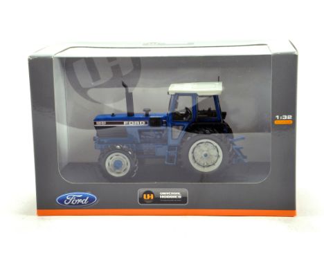Universal Hobbies 1/32 Farm Issue comprising Ford 8830 Tractor. NM to M in Box.