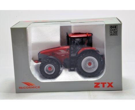 Universal Hobbies 1/32 farm issue comprising McCormick ZTX Tractor. NM to M in Box.