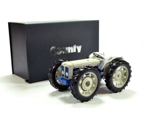 Universal Hobbies 1/16 diecast issue comprising County Super Four Tractor. E to NM to M in Box.