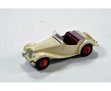 Dinky No. 108 MG Sports Car Export Issue with off white body, maroon interior, red ridged hubs with black smooth tyres. Missi