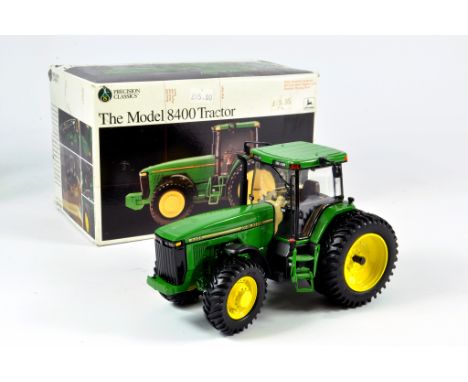Ertl 1/32 Farm Issue comprising precision series John Deere 8400 Tractor. VG to E in Box.