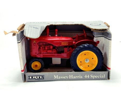 Ertl 1/16 diecast farm issue comprising Massey Harris 44 Special Tractor. E to NM to M in Box.