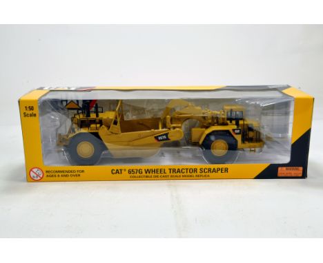 Norscot 1/50 Construction Issue comprising CAT 657G Wheel Tractor Scraper. E to NM in Box.
