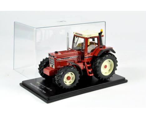 Wagenhoff Models 1/32 Farm Issue comprising International 1455XL Tractor. Short Run and Scarce issue is NM to M in Box.