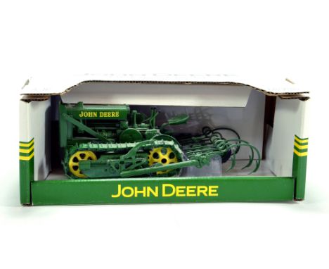 Ertl 1/16 Diecast Tractor Issue Comprising John Deere Crawler Tractor and Cultvator Set. Generally VG in Box.