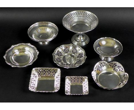 A collection of silver, including a silver collared decanter, the glass body and matching stopper formed as golf balls, Birmi