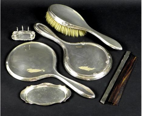 A selection of silver and silver backed dressing table items, comprising a silver backed hairbrush, Birmingham 1919, Hasset &