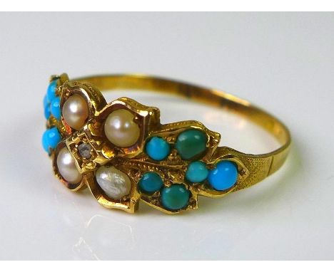 A Victorian gold ring set with turquoises, seed pearls and central diamond, marks to band rubbed but believed to be 18ct gold