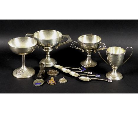 A group of silver sporting trophies, spoons and medals awarded to Tom Morton, comprising 'NWGC Hollymoor Cup, T. Morton, 1928