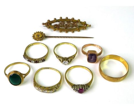 A group of five 9ct gold rings, including a ruby and diamond dress ring, size N, and a gentleman's wedding band, size T, 8g t