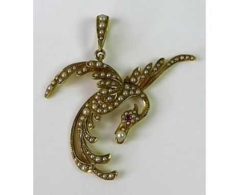 15ct gold and seed pearl pendant in form of a bird with a ruby eye, 4.8g. 