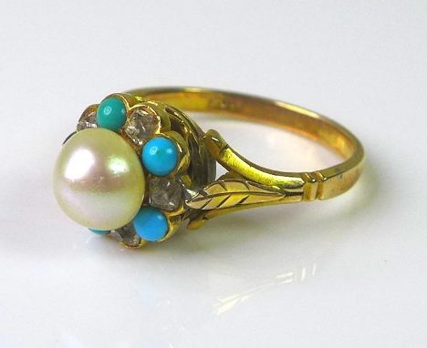 A 9ct gold ring set with turquoises and diamonds around a central pearl of approximately 6.5mm diameter, leaf shaped shoulder